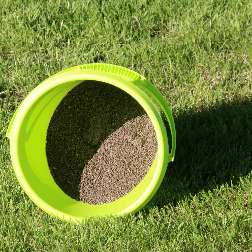 Eco-friendly lawn products - Bucket of fertiliser for lawn