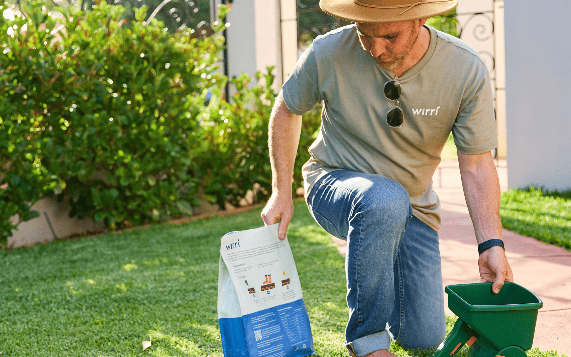 Australian Lawn Care - preparing fertiliser for use on lawn