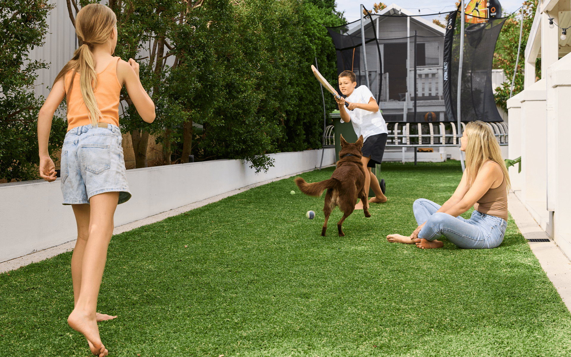 Australian Lawn Care - Family playing at their lawn