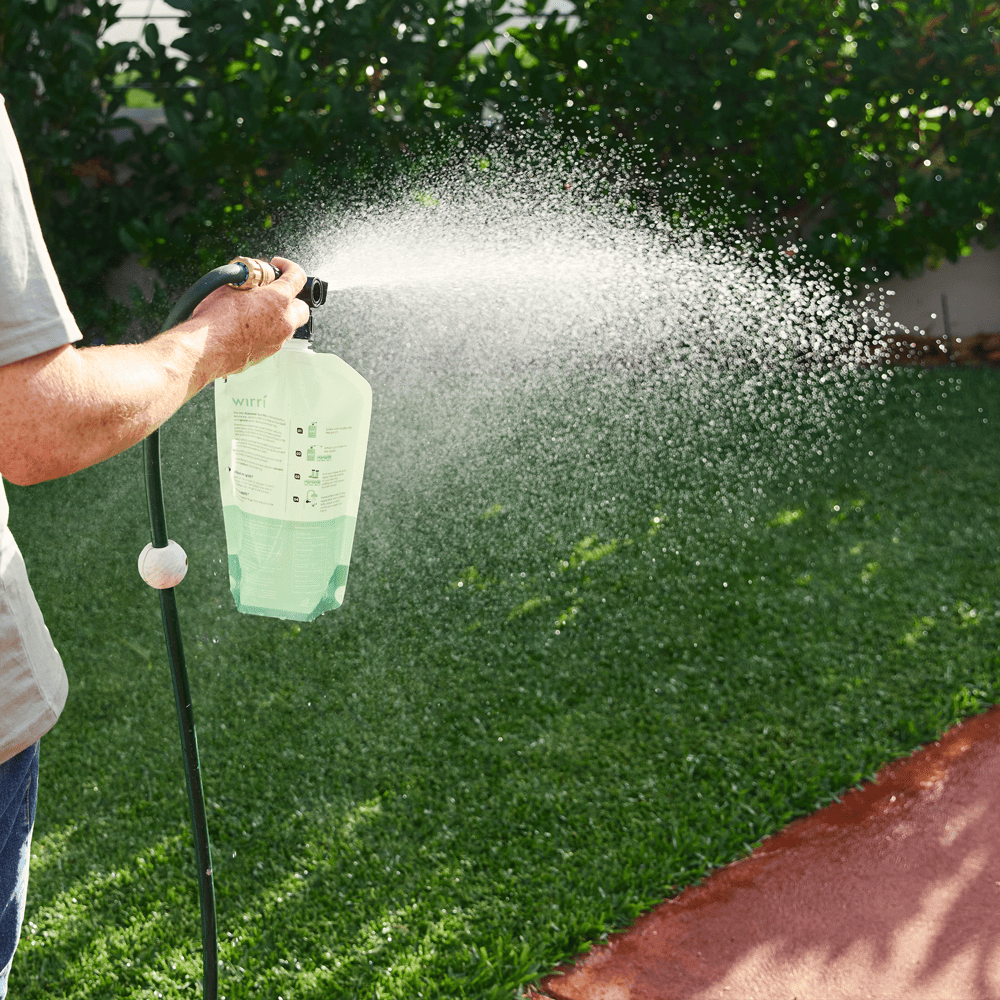 Winter Lawn Care - Man using Wirri spray product
